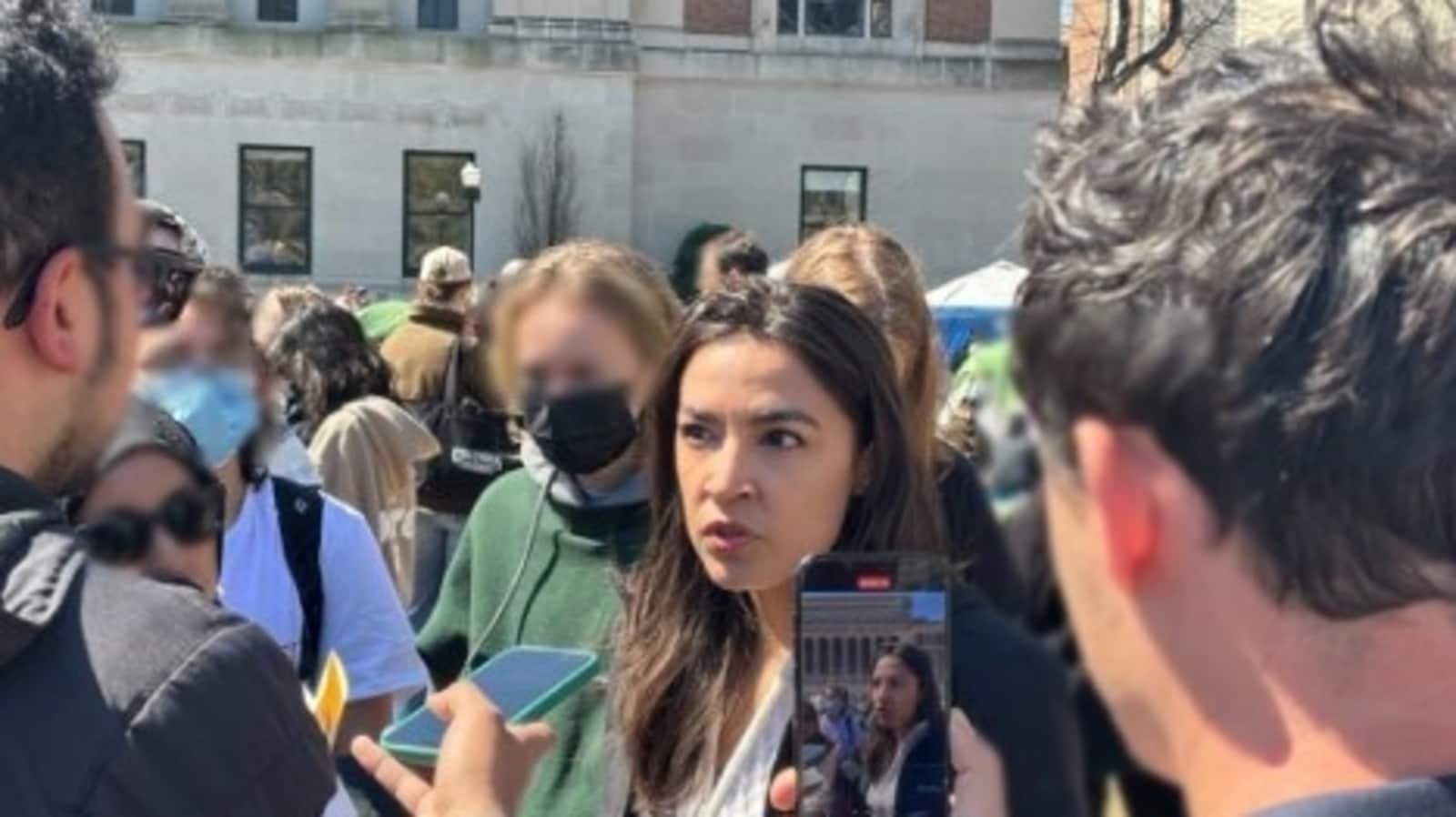 The person who organized the protest at Columbia University criticized AOC for her visit, saying that politicians who support Israel are the ones causing trouble from outside.